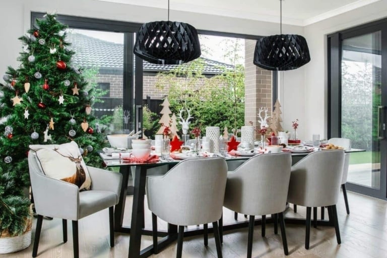 scandinavian red and white christmas table setting by the life creative interiors