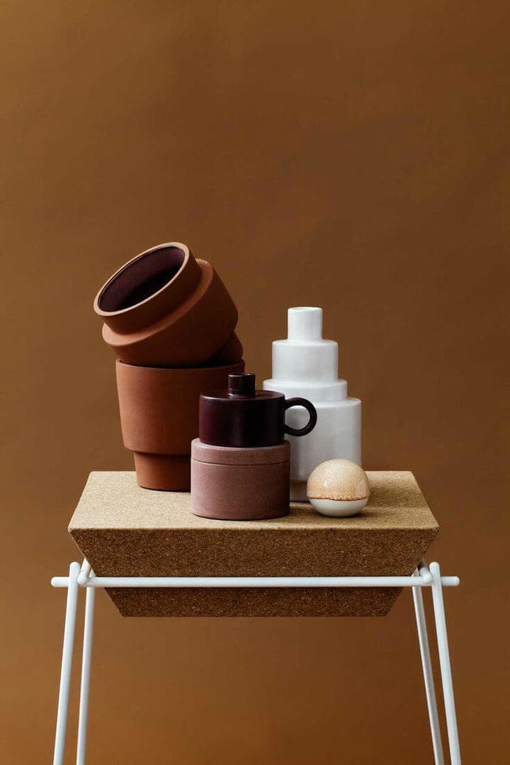terracotta home decor on cork side table interior design trends 2017