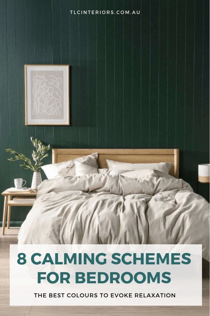 dark green bedroom wall with blonde timber bed