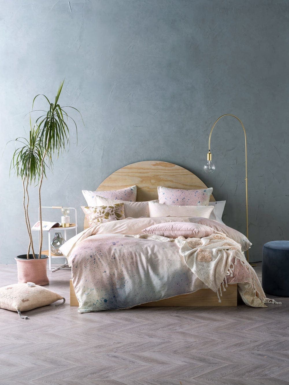 grey satin paint on bedroom wall with bedding from linen house