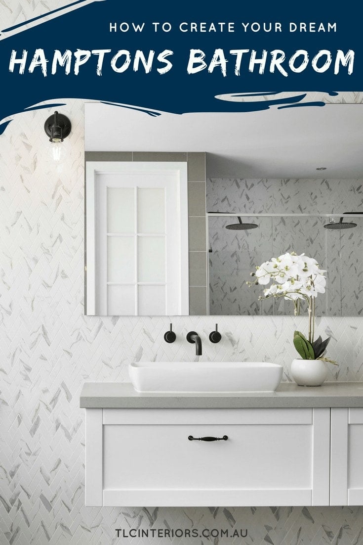 hamptons style bathroom with marble herringbone tiles and floating vanity and black tapware