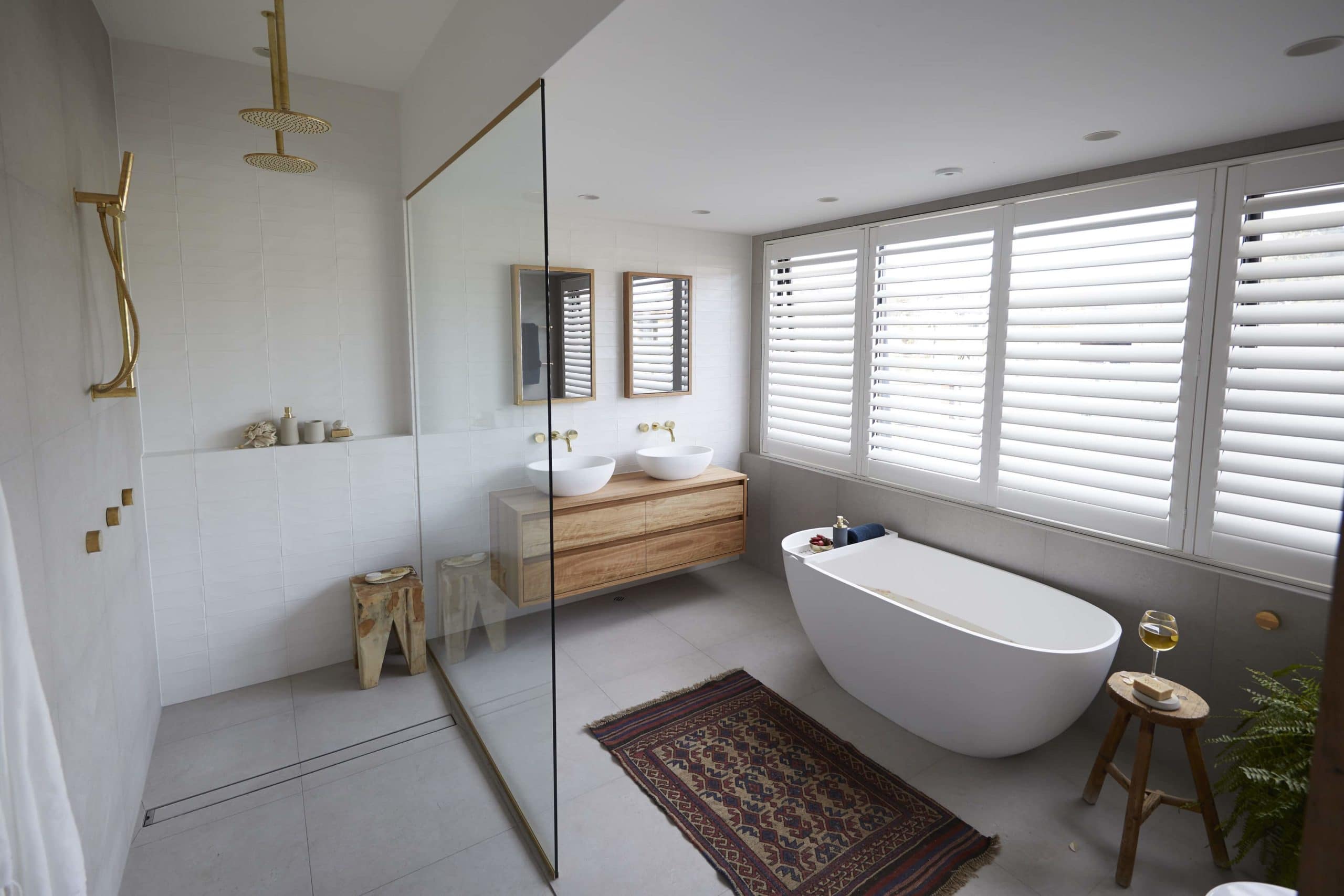 the block 2020 andy and deb bathroom with brushed gold tapware
