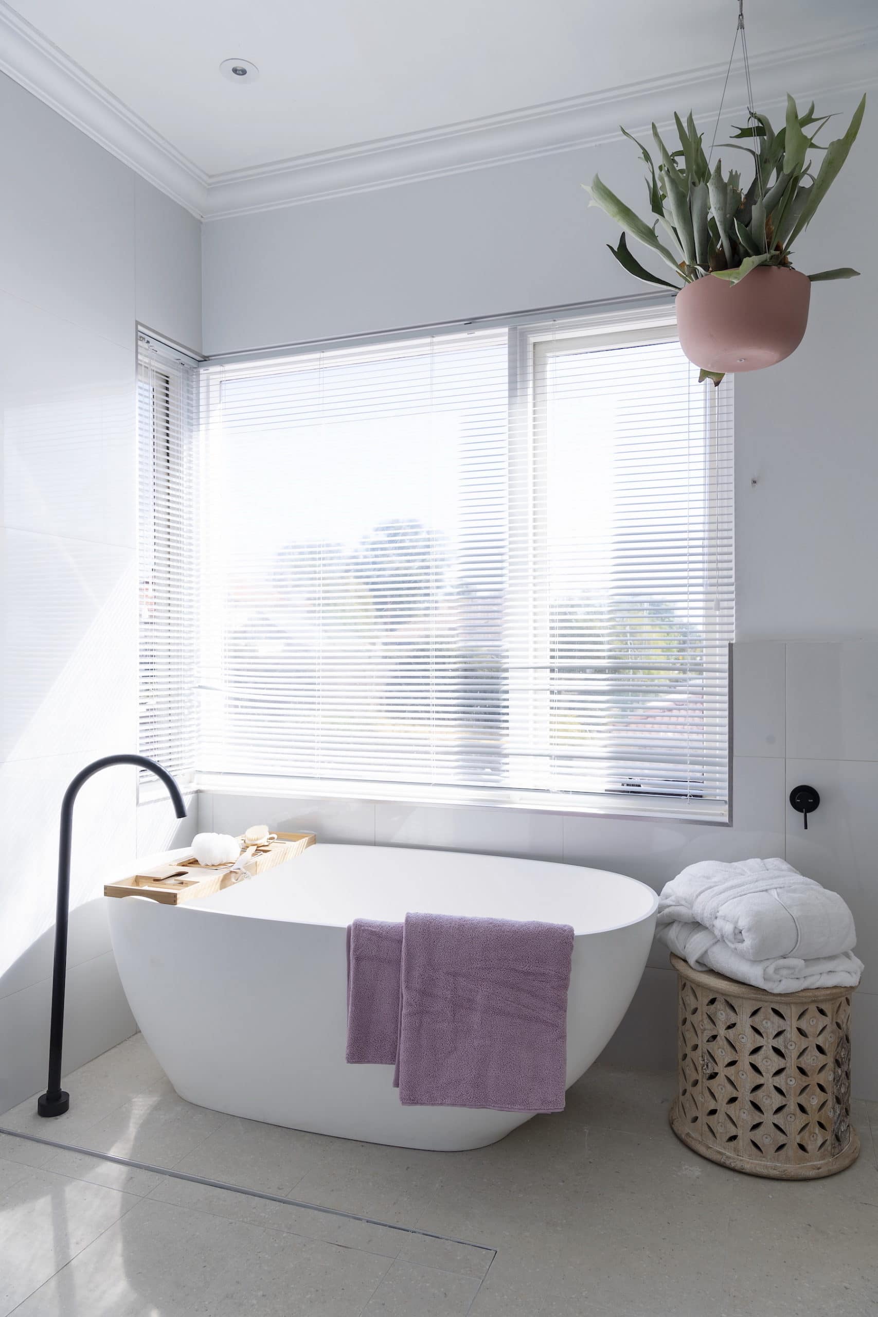 house rules 2020 tanya and dave reveal white freestanding bath tub with matt black floor tap