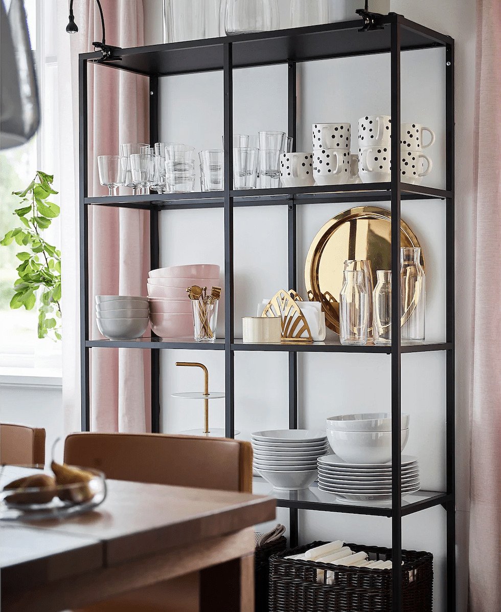styling a cube shelf black shelf with gold and pink styling