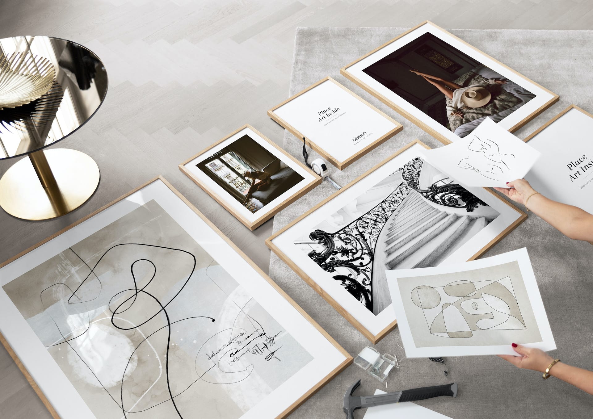creating a gallery wall with oak frames and desenio art