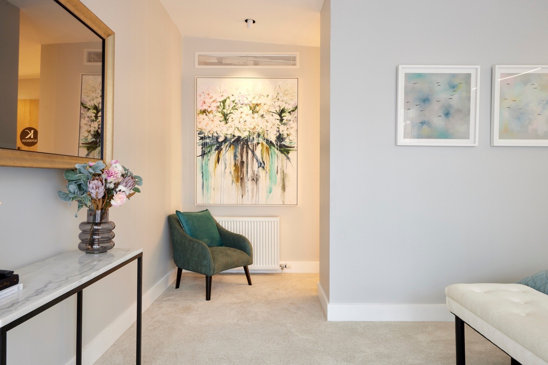 the block 2021 josh and luke master bedroom armchair and artwork