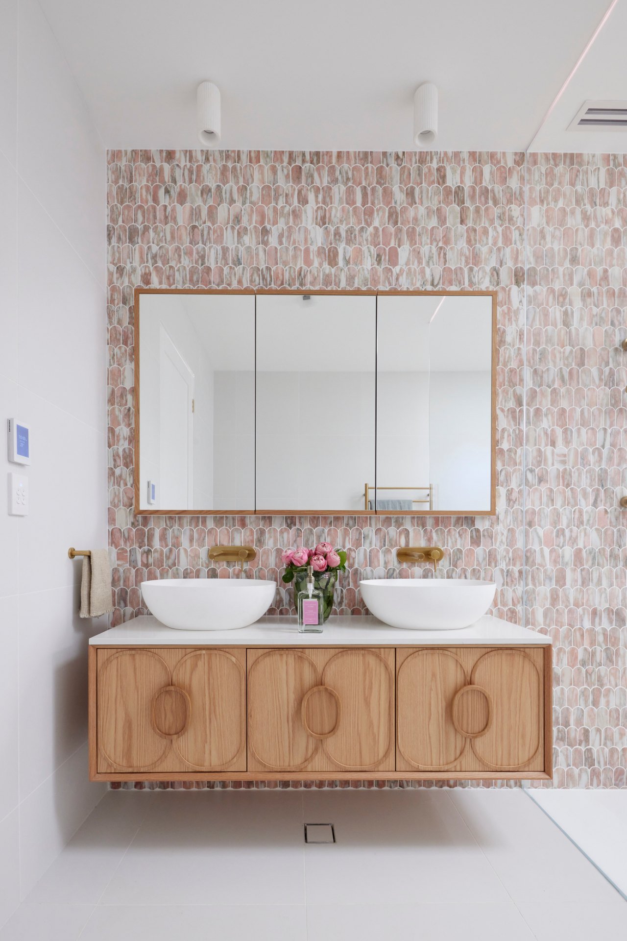 the block 2021 mitch and mark guest bathroom pink and grey marble mosaic tiles