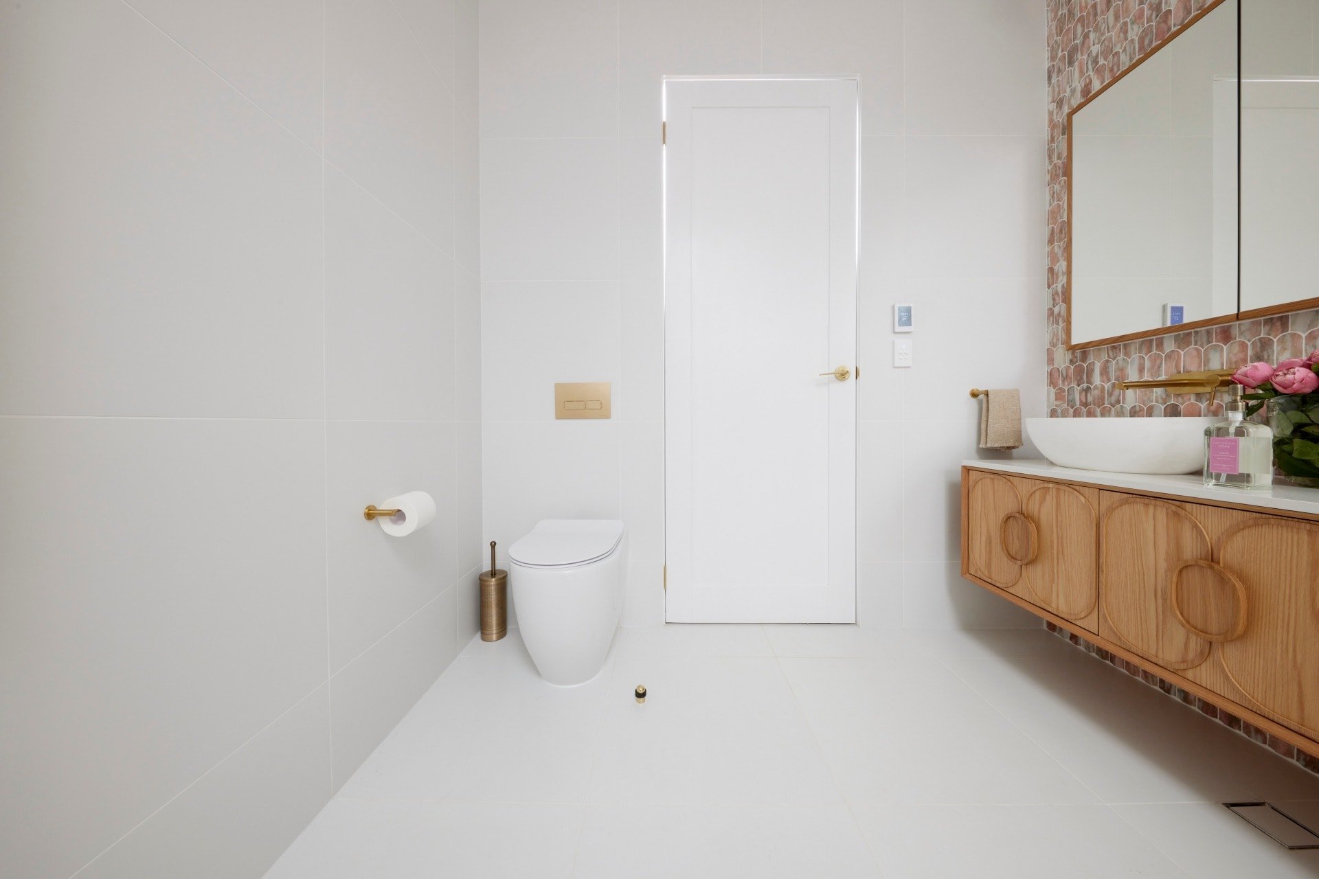 the block 2021 mitch and mark guest bathroom toilet behind door
