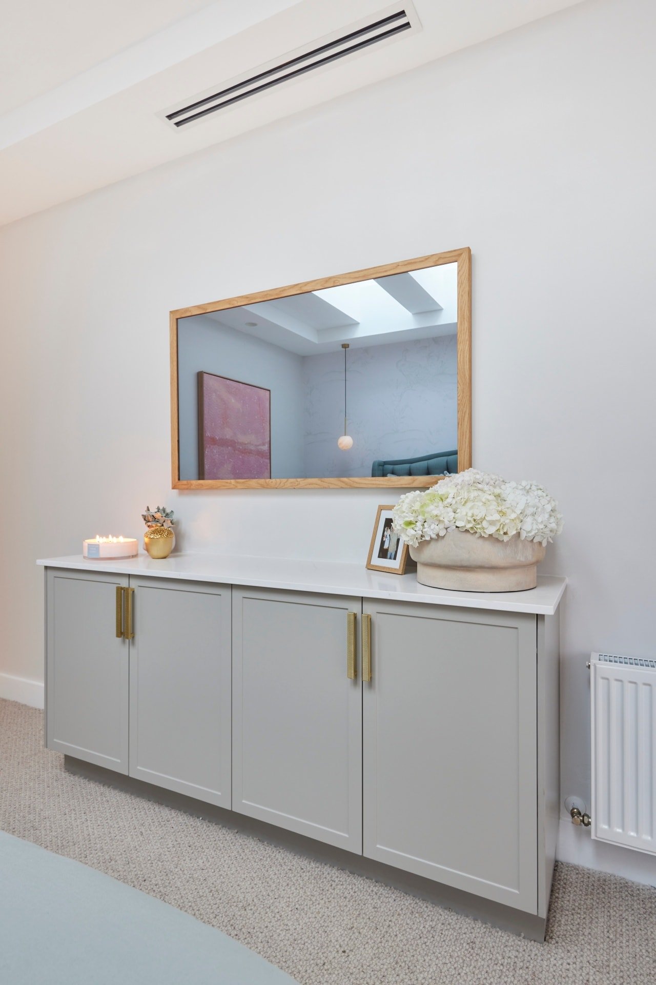the block 2021 mitch and mark master bedroom built in sideboard with mirror