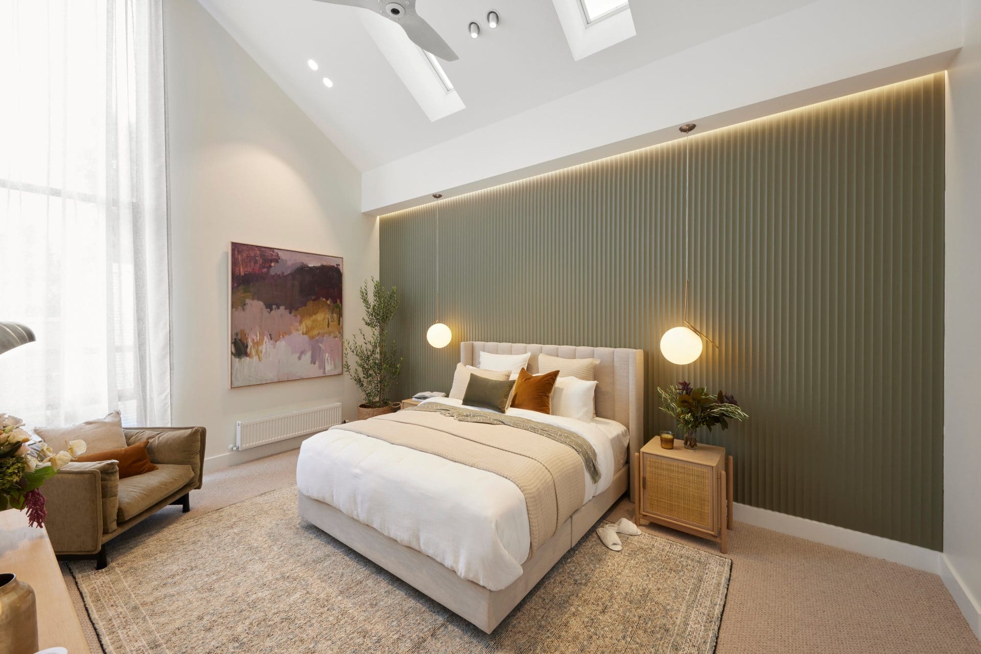 the block 2021 ronnie and georgia master bedroom with green feature wall