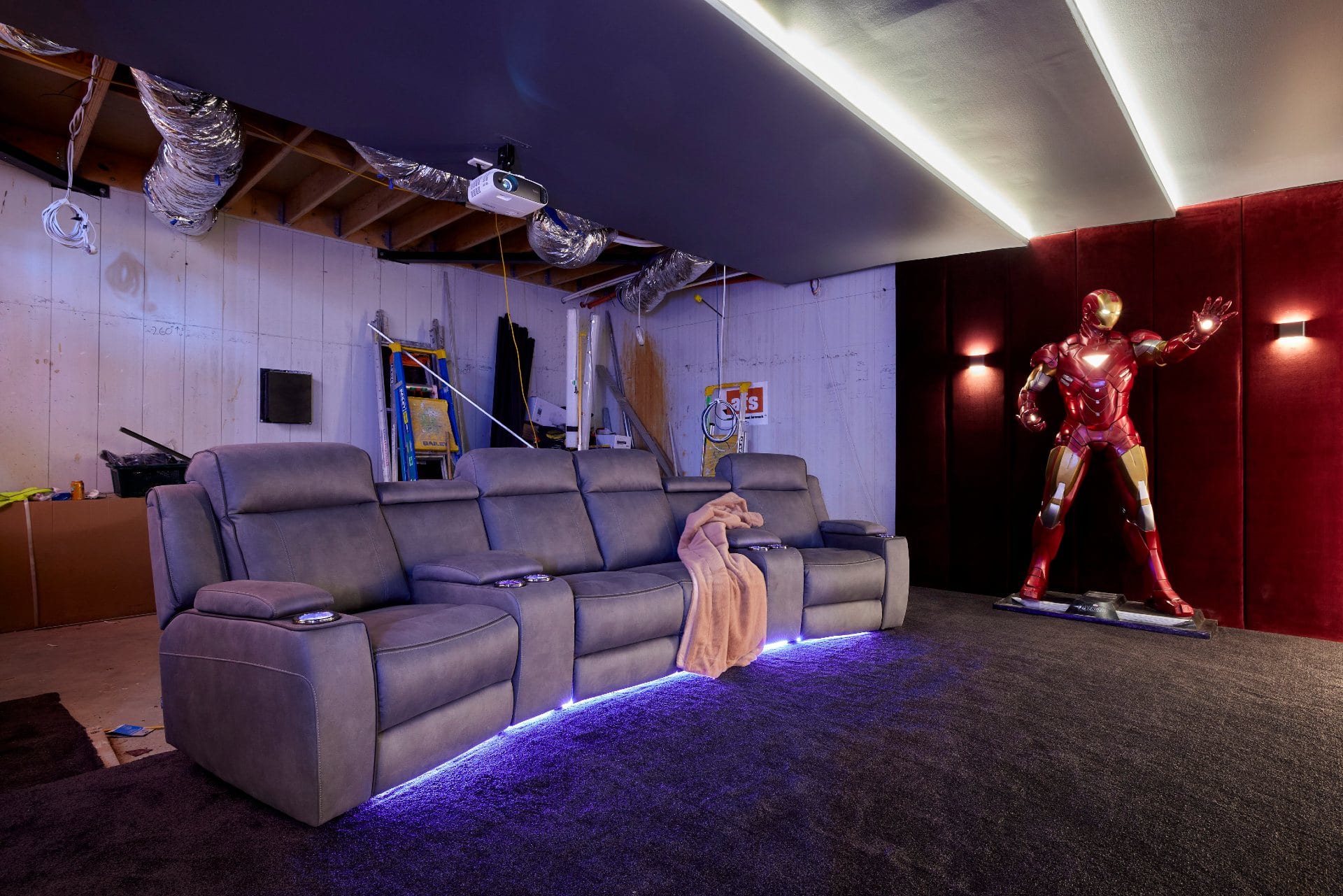 the block 2021 josh and luke home cinema room iron man statue
