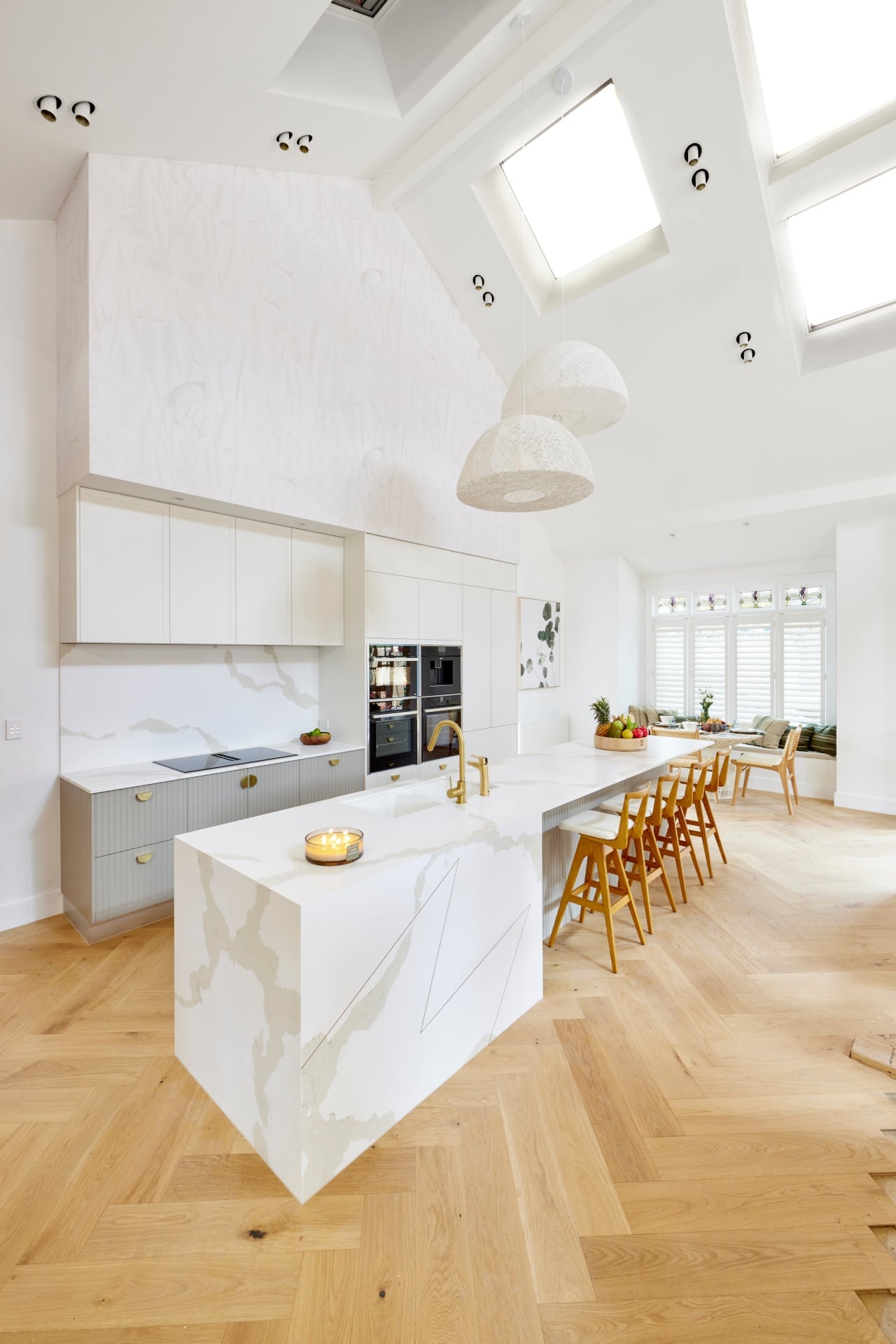 the block 2021 mitch and mark kitchen with vaulted ceiling skylights and brass tapware