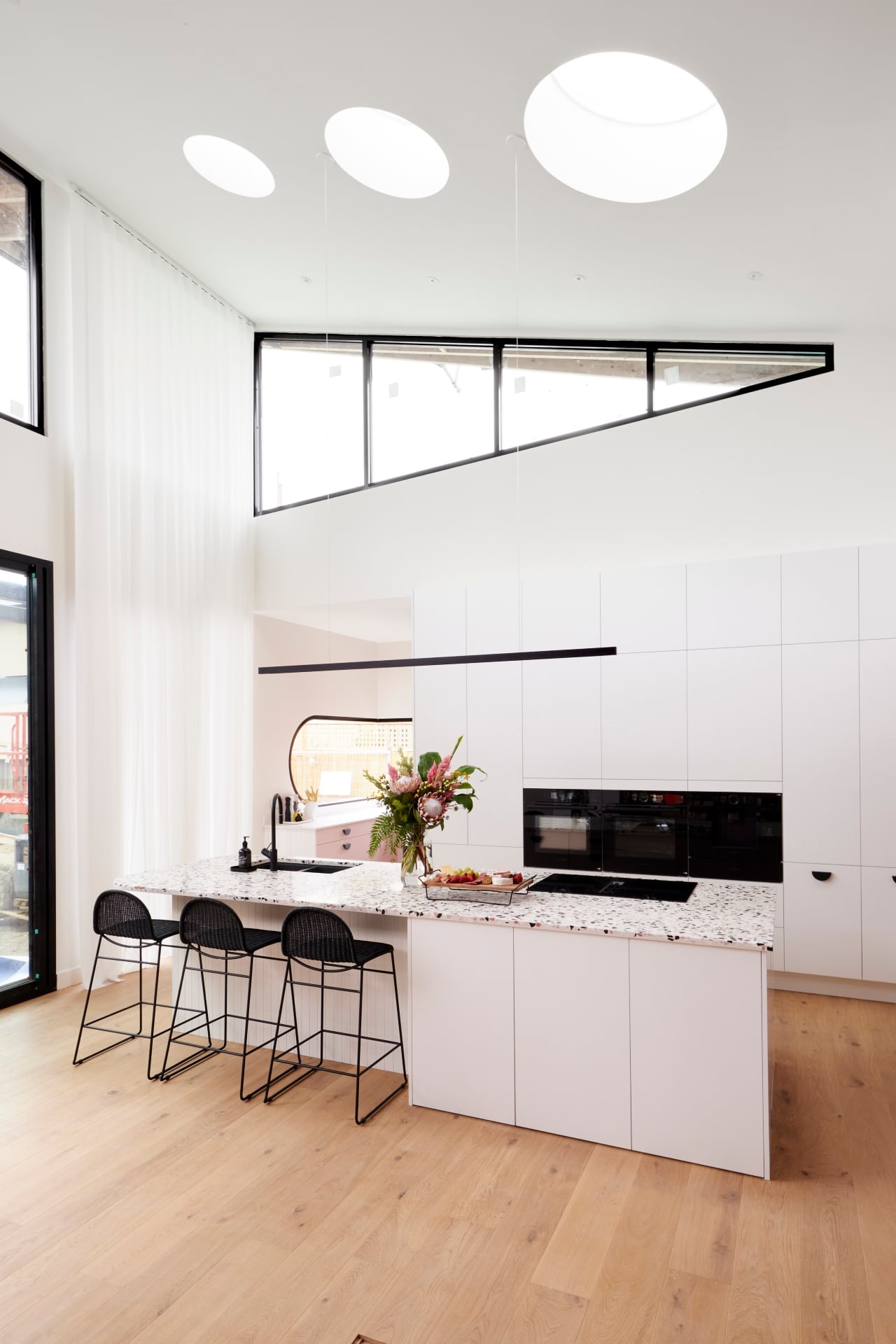 the block 2021 tanya and vito kitchen with vaulted ceiling and round skylights