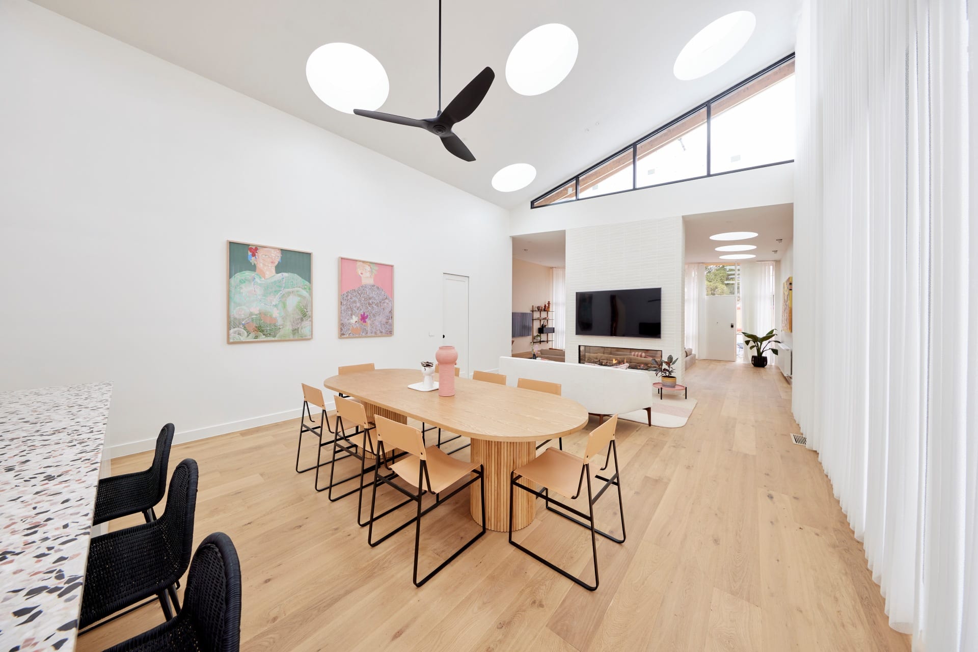 the block 2021 tanya and vito dining room with oval timber dining table and leather dining chairs