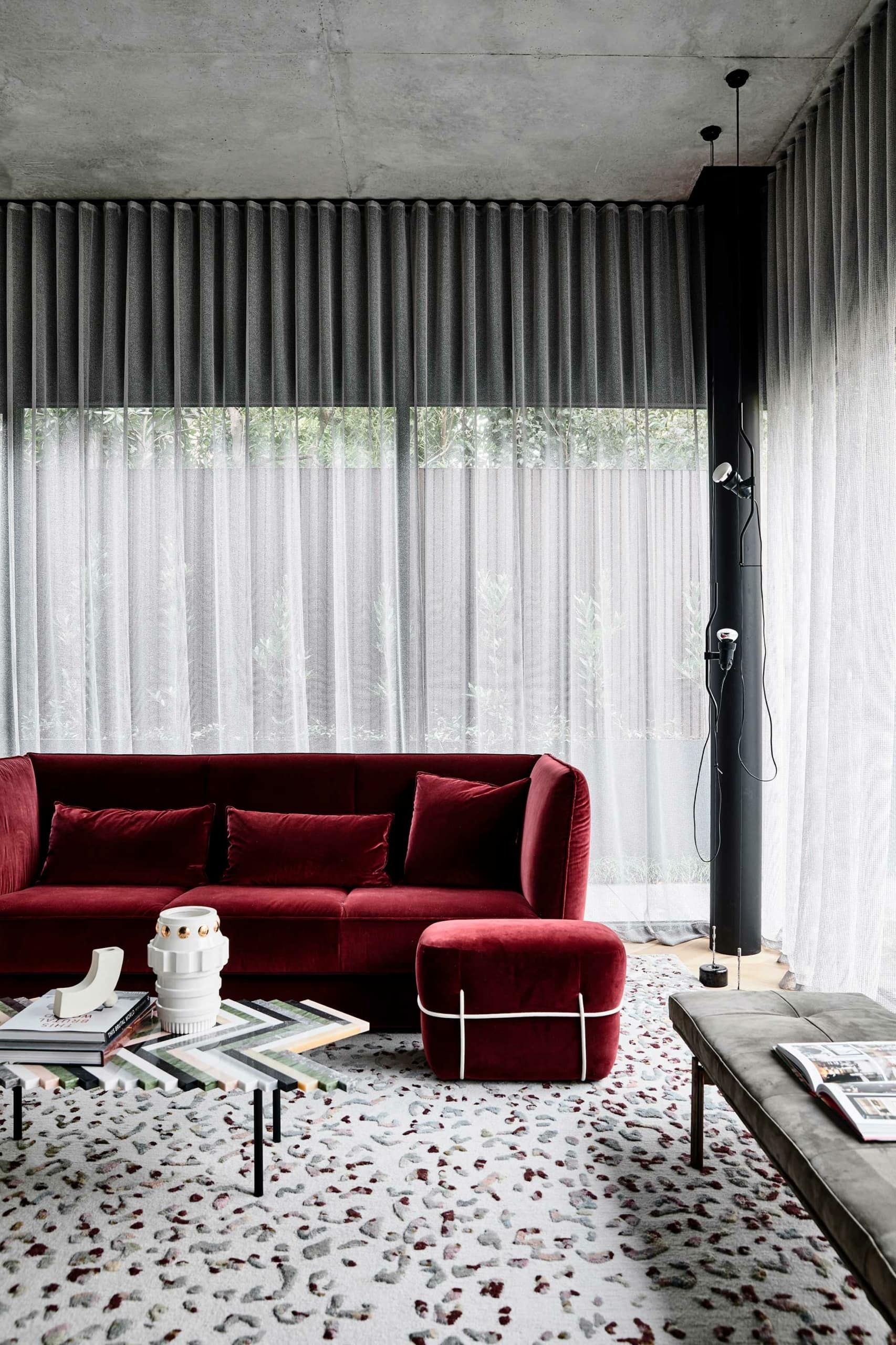 loom rugs black and white pattern rug in living room with burgundy sofa