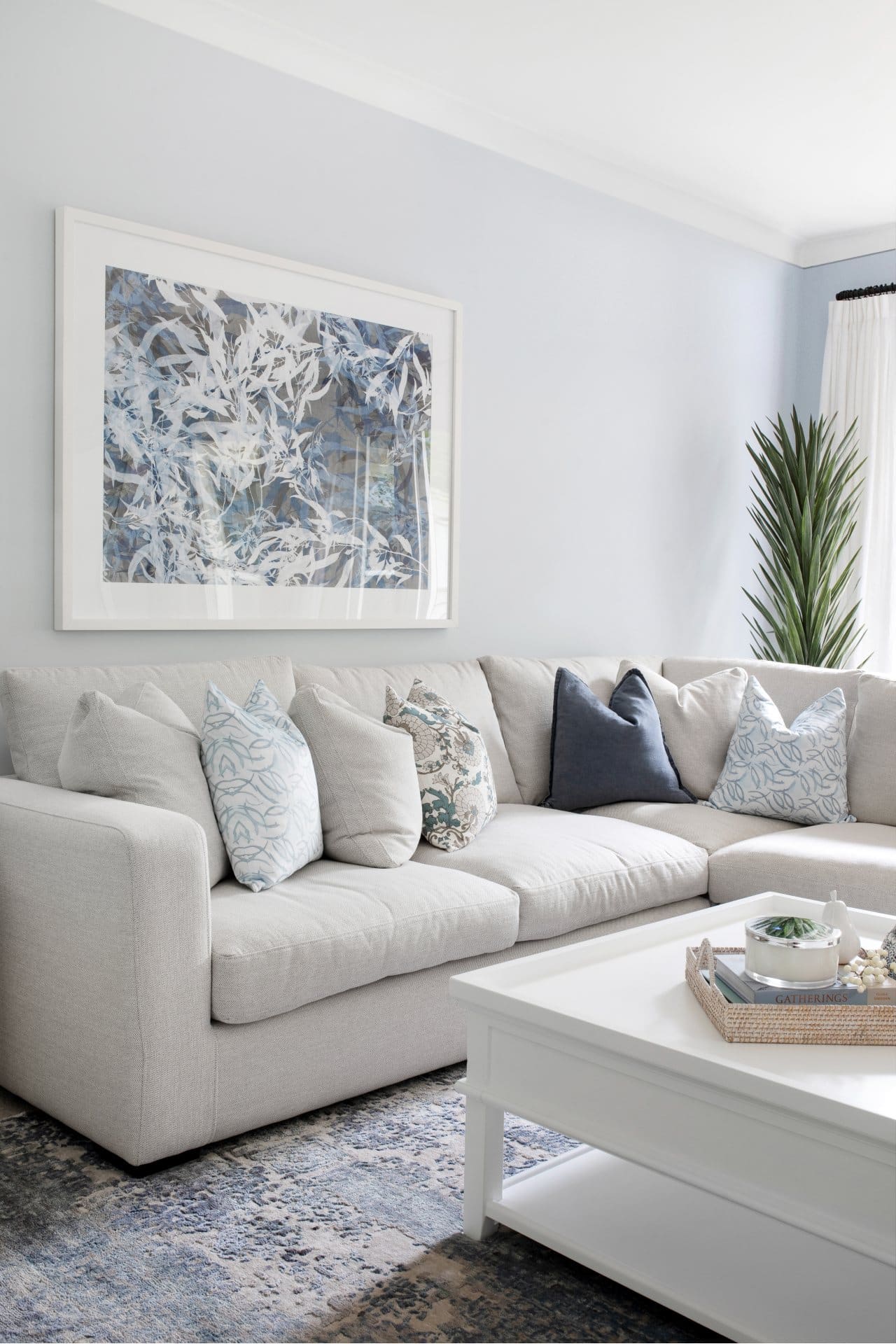 Hamptons Style Interior Design 10 hamptons living room with light grey sofa light blue walls and white coffee table