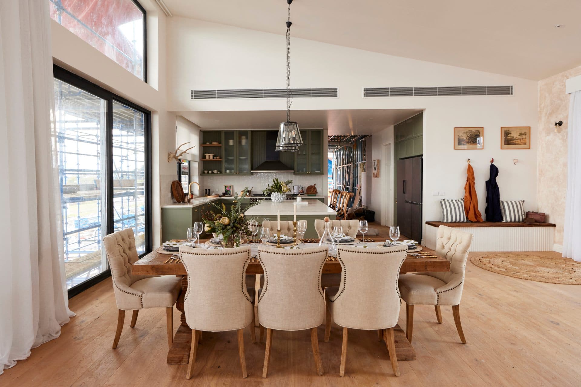 the block 2022 dylan and jenny dining room with provincial dining chairs and rustic table