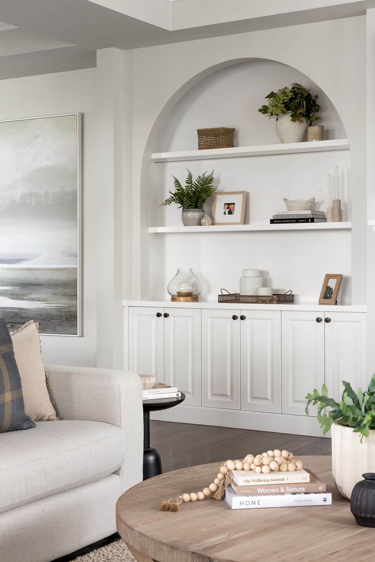 Farmhouse Interior Design 3 modern country living room arched shelf with shaker cabinets below