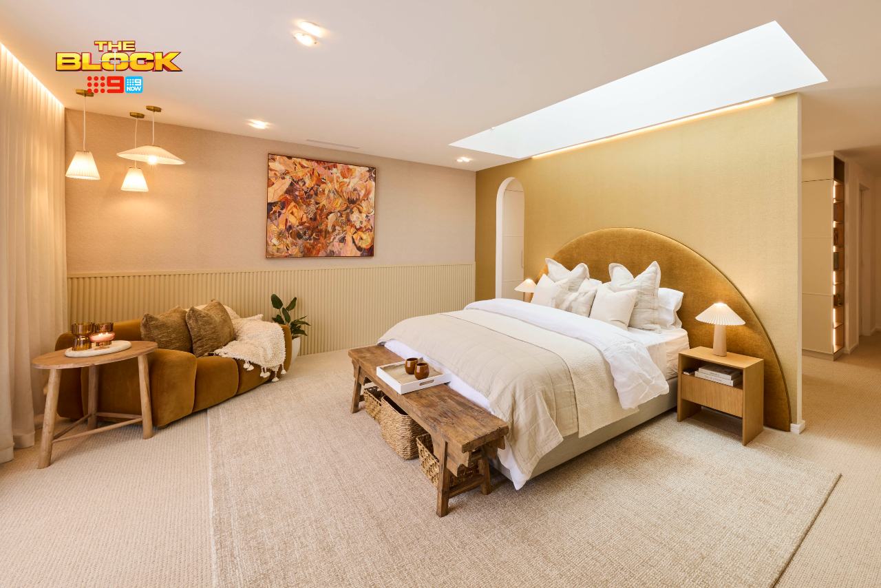 the block 2025 britt and taz main bedroom arched mustard headboard