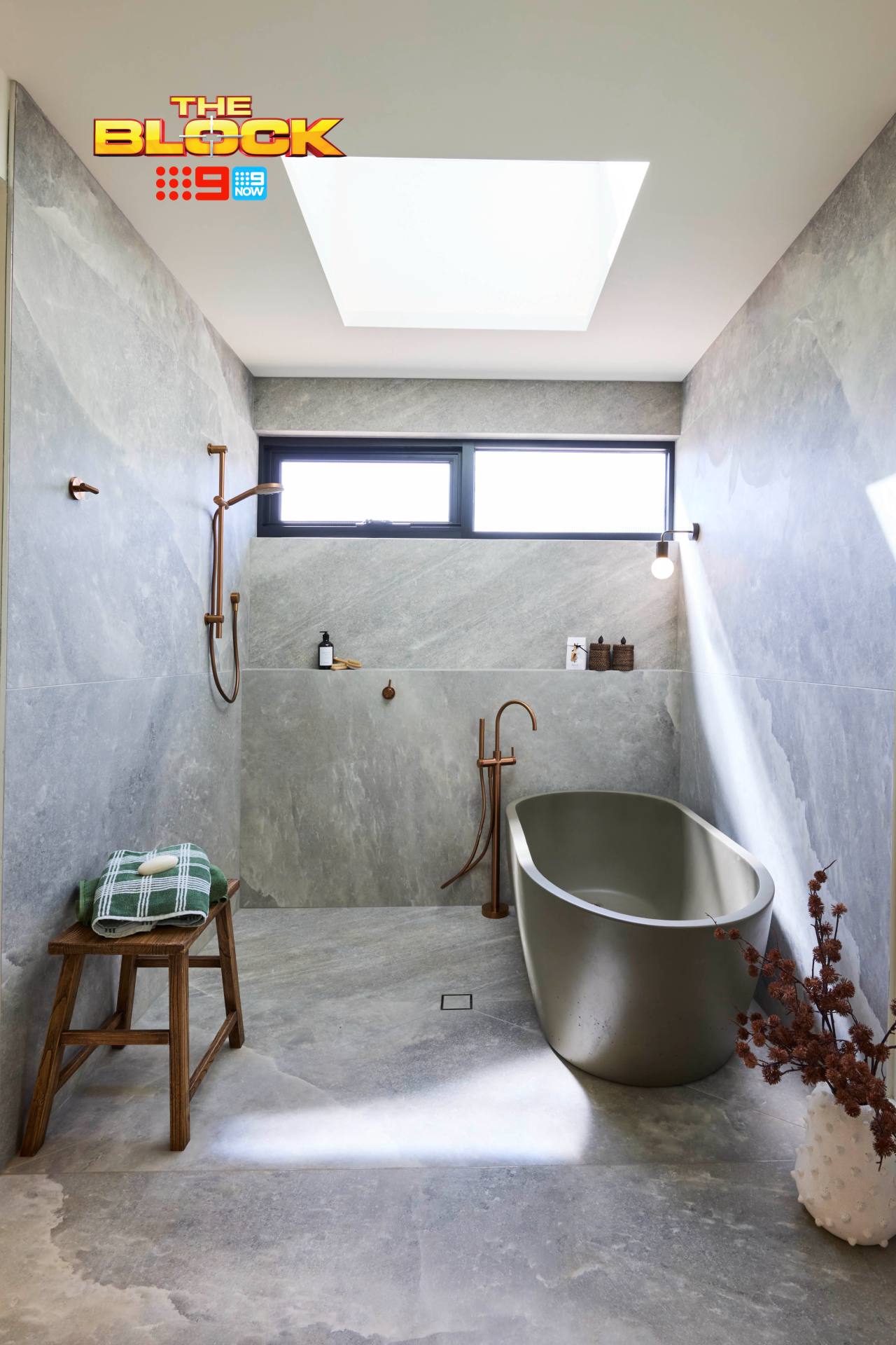The Block 2025 Main Bathrooms Reveal: Design Sins, Wins, and That Red Bathtub 12 the block 2025 sonny and alicia main bathroom with grey floor and wall tile