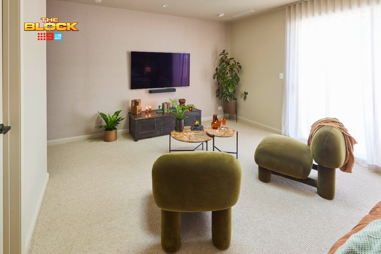 the block 2025 guest bedroom reveals robby and mat green armchairs facing tv