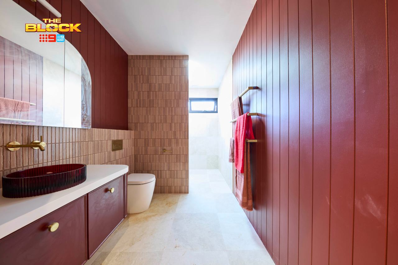 the block 2025 han and can red guest bathroom walls