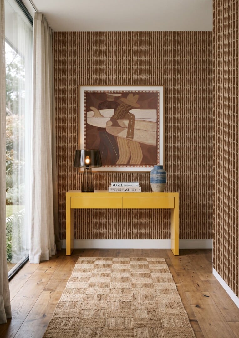 Ultimate Wallpaper Guide: 25 Ideas, Expert Advice and Where to Shop 11 brown handdrawn stripe wallpaper in entry with yellow console table