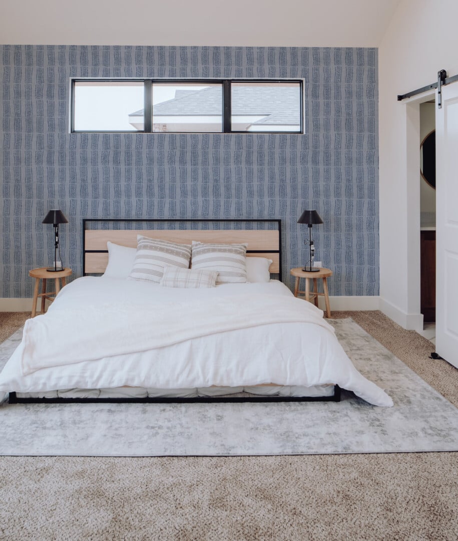 Ultimate Wallpaper Guide: 25 Ideas, Expert Advice and Where to Shop 23 navy blue striped wallpaper on bedroom feature wall olive et oriel